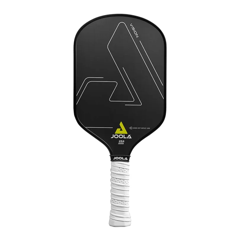 De Joola Vision CGS 14mm pickleball paddle, wit en zwart met het Joola logo, liggend op een pickleballveld
